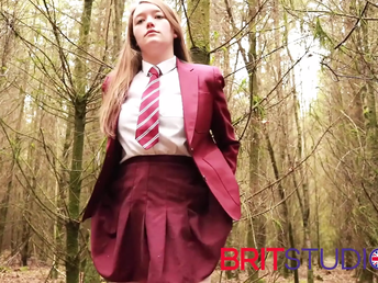 Olivia, the schoolgirl in uniform, uses her vest-pocket to pee outdoors
